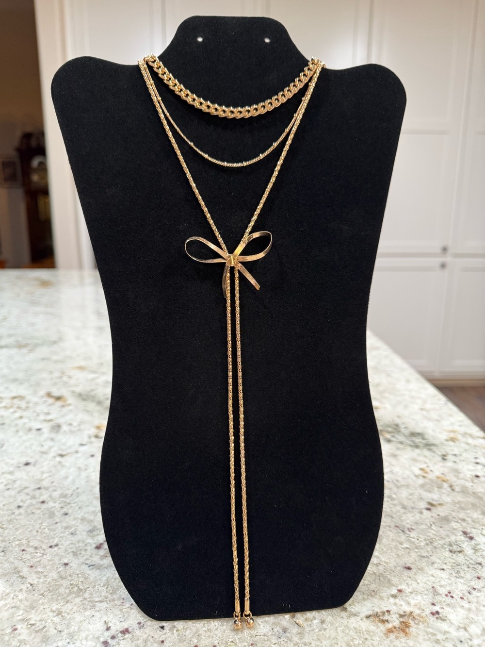 Shyanne Gold tone Layered Bow Lariat Necklace